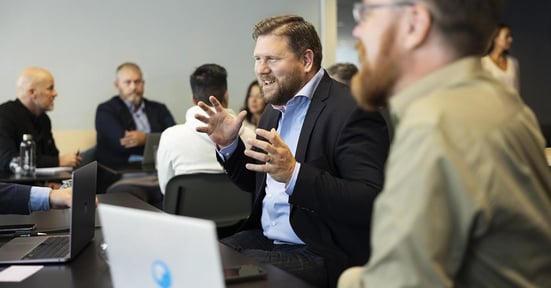 People in front of computer